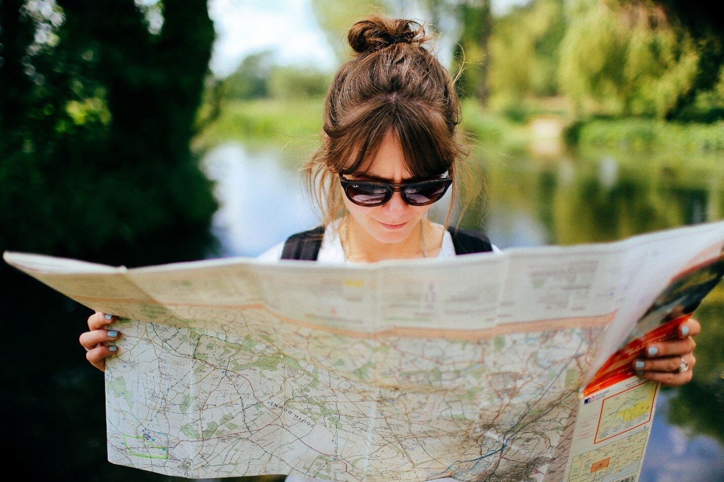 Woman looking at map