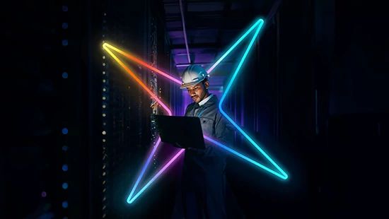 an employee in a data center surrounded by the Ecolab Spark